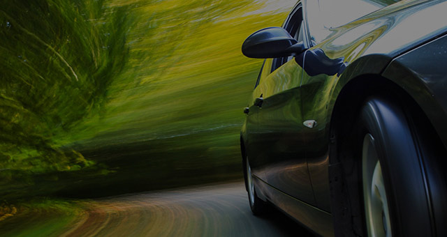 Car driving in the speed with a sharp curve